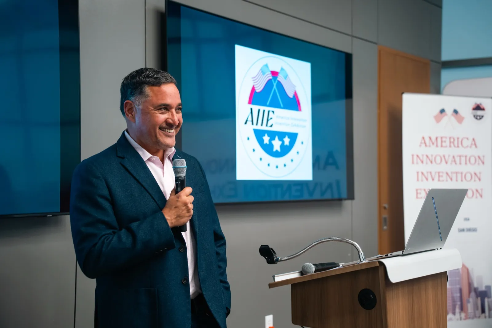 A member of the AIIE panel addressing the room at the 2026 exhibition